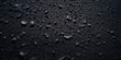 Abstract black stone material texture background, drops, cracks.