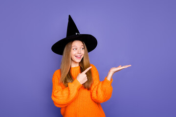 Canvas Print - Photo of girl interested looking pointing finger novelty on her arm second ticket for halloween free isolated over purple color background