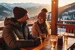 A cheerful young couple shares happiness and love on a winter vacation, enjoying hot drinks in cafe and the snowy outdoors.