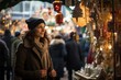 A person explores a bustling winter market in the heart of the city, surrounded by stalls selling festive goods and holiday decorations