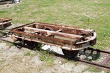 Fototapeta Na sufit - A rusty platform of a narrow-gauge railway carriage