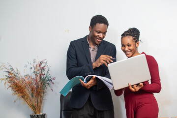 Wall Mural - african business man and woman working together in office