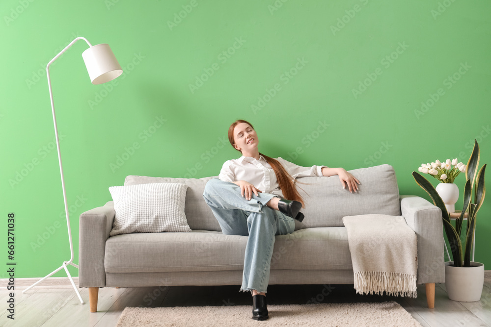 Young woman resting at home after long working day