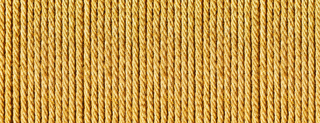 Wall Mural - Rope texture. Yellow old rope lines. Striped pattern. Retro textile texture. Stripes background on canvas. Twine pattern. Panoramic rope background. Website header design.