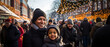 crowd of people on a german christmas market with a black latina an her son in focus