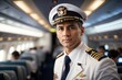 portrait of the captain of a passenger plane with inside the plane