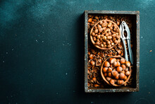 A Set Of Hazelnuts In A Wooden Box. Organic Healthy Autumn Nuts. Hazelnut Nut Health Organic Brown Filbert Autumn Background Concept.