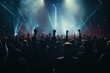 © Fotograf - A vibrant image of a large crowd of people at a concert, all raising their hands in excitement. Perfect for capturing the energy and atmosphere of live music events. .