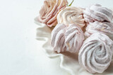 Fototapeta Tulipany - Homemade sweet marshmallow or zephyr, homemade delicate sweet close-up.