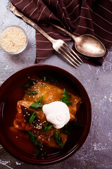 Sticker - Stuffed cabbage with tomato sauce decorated with parsley