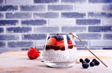 Poster - Healthy breakfast, desert, with chia seed pudding, cream, raspberry jam and fresh berries