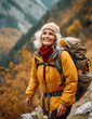 © Olga Miltsova - active mature caucasian woman hiking travelling in mountains with backpack, Generative AI