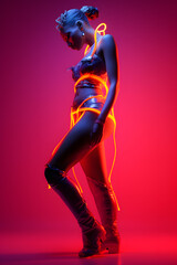 Wall Mural - Fashion stylish African woman in neon costume and neon shoes, in the style of futuristic pop, luminous color palette