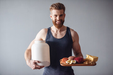 Wall Mural - Man with sport nutrition