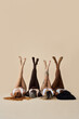 © insta_photos - Young diverse women raising legs up showing smooth skin lying on beige background. Multicultural girls beauty models advertising body care lotion, epilation, depilation, waxing, sugaring. Vertical.