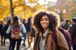 © Trinette Reed - Black woman college student going back to school with students