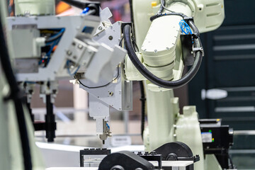 Sticker - robot arm working in car factory