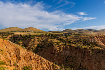 Wall Mural - Green hills and blue sky view of Sellicks, South Australia.