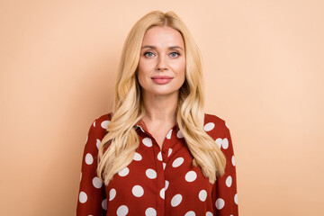 Sticker - Portrait photo of young confident business lady wear dotted red shirt serious face serious company owner isolated on beige color background