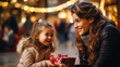 Smiling girl holding gift box with mother on Christmas background