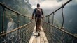 A hiker crosses a foot bridge 