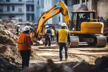 A Team Of Workers Against The Backdrop Of Large Construction Vehicles. Bulldozers And Excavators. The Process Of Preparing The Foundation Of A Building. Construction Site