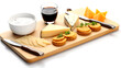 Enjoy a gourmet cheese plate ensemble, featuring knives and garnishes for an exceptional presentation of flavorful cheeses.