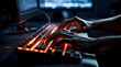 hacker hand typing on a sleek