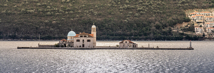 Strp, Montenegro - 27 january 2023 - View on the Church of the Madonna dello Scalpello in  the Bay of Kotor (Бока Которска)