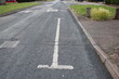 White access lines sometimes referred to as H bars to deter motorists from parking in the area