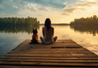 © svastix - A woman with a dog is sitting by the lake
