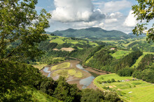 Landscape Of The Mountains Covered By Green Vegetation And Urola River On The Surrounding Of Zumaia On A Sunny Day With Clouds, Gipuzkoa, Basque Country, Spain