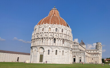 Wall Mural - The Baptistery of Pisa Leaning Tower at the Piazza dei Miracoli or the Square of Miracles in Pisa, Italy