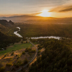 Wall Mural - Drone style photo from Central Oregon, shot at sunset and focusing on the nature and riverscape. 