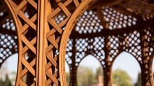 Detailed View Of Lattice Woodwork On A Gazebo.