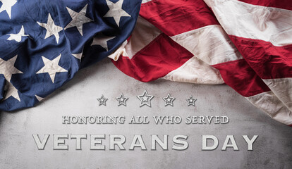 Wall Mural - Happy Veterans day concept made from American flag and the text on dark wooden background.