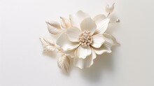 A Beautiful White Flower Brooch On A White Background. The Brooch Is Made Of White Enamel And Has A Gold Stem And Leaves. The Center Of The Flower Is Adorned With Small Pearls.