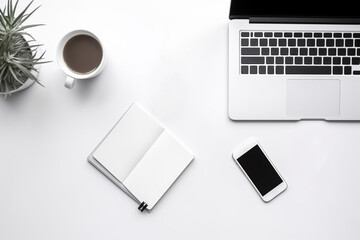 Modern white office desk table with laptop, smartphone and blank notebook and cup of coffee, flatlay, top view workspace, business