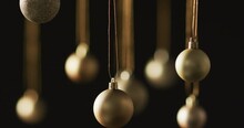 Video Of Gold Baubles Christmas Decorations With Copy Space On Black Background