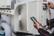 © Nonthanat - air conditioner ,measuring equipment for filling air conditioners.