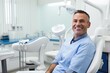 © Simon - Portrait of a happy dentist at work.