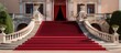 Marble stairs lead to a historic hotel with a red carpet entrance With copyspace for text