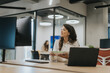 © BGStock72 - Young business woman working on laptop in the modern office