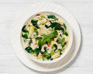 Canvas Print - chicken spinach artichoke creamy soup in a bowl