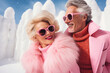 © Glittering Humanity - An eccentric older couple embrace the winter with funky pink fur coats and sunglasses, their smiles as bright as the snow around them