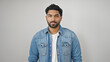 © Krakenimages.com - African american man standing with serious expression over isolated white background