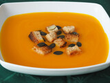 Fototapeta  - Pumpkin soup with croutons and pumpkin seeds