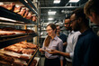 Surrounded by rows of spices and ingredients, a team of technologists smiles as they exchange thoughts on a recipe, working collaboratively to perfect the taste of meat products. 