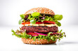 Hamburger with beef patty and fresh vegetables on white background