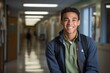 © tiena - Smiling young male student in a college hallway. AI generative